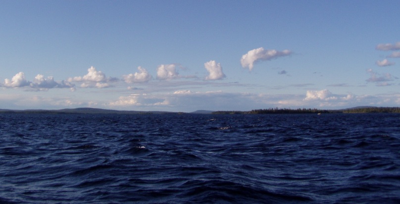 Rounded peaks of mountains on the banks of Tikshe-lake in Karelia